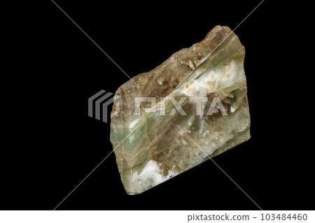 macro stone Fluorite mineral on a black background macro stone Fluorite mineral on a black background 103484460