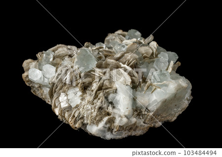 Macro mineral stone Aquamarine in rock on a black background 103484494