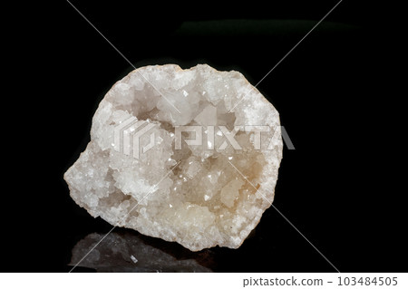 Macro mineral quartz snow stone on a black background 103484505