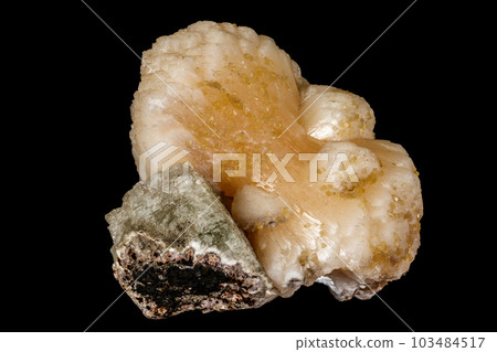 Macro mineral stone Stilbite on Apophyllite on a black background 103484517