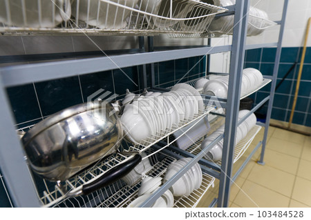 Restaurant kitchen equipment for preparing food, meal, plates, detail. 103484528