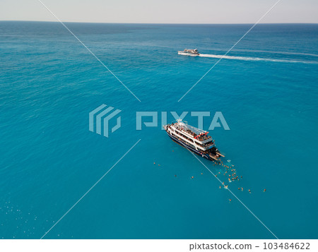 aerial view of porto katsiki beach with cruise boat people having fun aerial view of porto katsiki beach with cruise boat people having fun 103484622