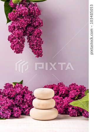 Wood stones podium and lilac flowers. Concept scene stage showcase for new product, banner, promotion sale, cosmetic, presentation 103485053