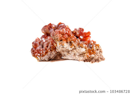 Macro mineral stone Vanadinite on a white background 103486728