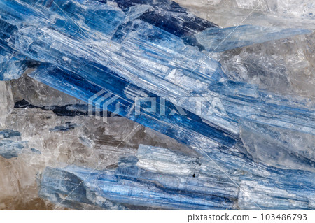 Macro mineral stone Kyanite a white background Macro mineral stone Kyanite a white background 103486793