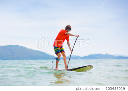 Man on stand up paddle. Water and beach sport 103488019