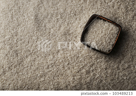 Rice and clay bowl background with copy-space 103489213