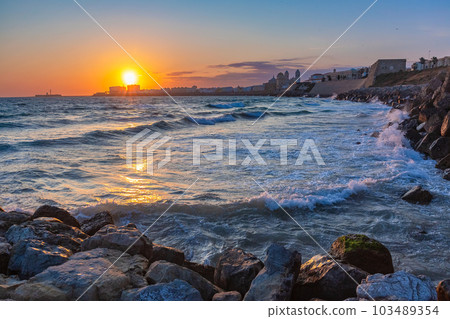 Beach and Cathedral in Cadiz, Andalusia, Spain 103489354