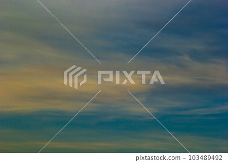 sunset sky with multicolor clouds. Dramatic twilight sky background sunset sky with multicolor clouds. Dramatic twilight sky background 103489492