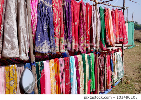 Market selling sarees in Goa, India Market selling sarees in Goa, India 103490105