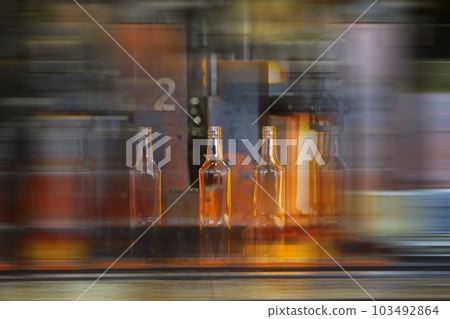 Background blurred glass bottle production Background blurred glass bottle production 103492864
