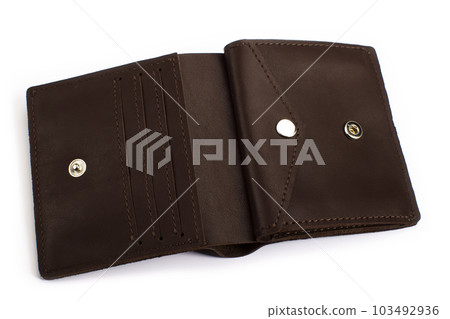 Open brown leather wallet on a white background Open brown leather wallet on a white background 103492936