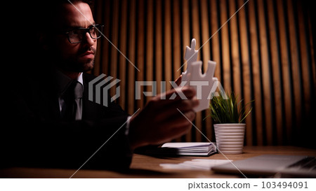 Attractive young guy is solving a problem Attractive young guy is solving a problem 103494091