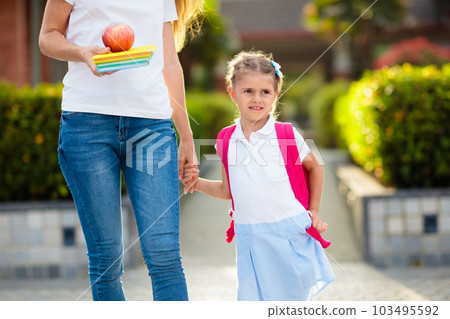 School pick up. Mother and kids after school. 103495592