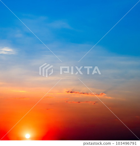 Bright sunrise on the blue sky. Bright sunrise on the blue sky. 103496791