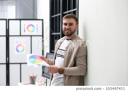 Portrait of male designer in office. Creative profession 103497451
