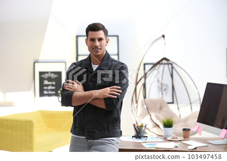 Portrait of male designer in office. Creative profession Portrait of male designer in office. Creative profession 103497458