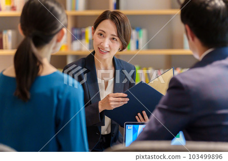 Advisor receiving customer consultation Advisor receiving customer consultation 103499896