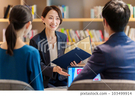 Advisor receiving customer consultation Advisor receiving customer consultation 103499914