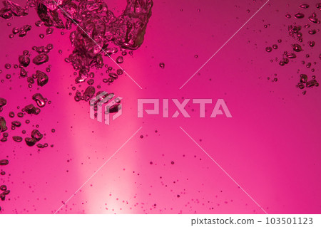 Air bubbles in water red background Air bubbles in water red background 103501123