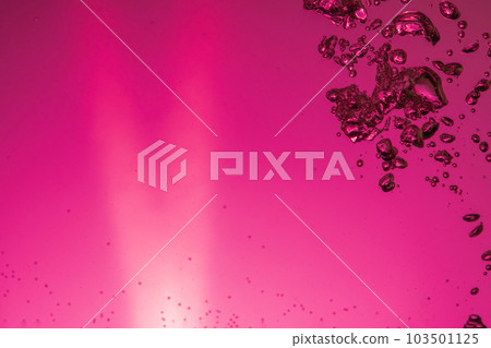 Air bubbles in water red background Air bubbles in water red background 103501125