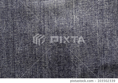 Close-up of the fabric background and denim texture. Close-up of the fabric background and denim texture. 103502339