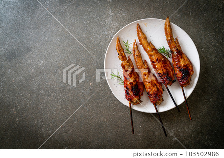 grilled chicken wings skewer grilled chicken wings skewer 103502986