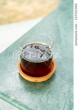 iced americano coffee glass on table 103502989