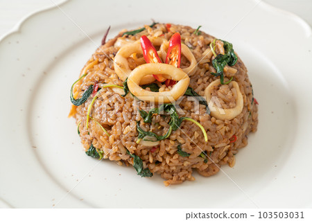 fried rice with squid and basil in Thai style fried rice with squid and basil in Thai style 103503031