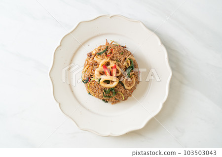 fried rice with squid and basil in Thai style fried rice with squid and basil in Thai style 103503043