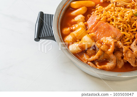 Budae Jjigae or Budaejjigae (Army stew or Army base stew). It is loaded with Kimchi, spam, sausages, ramen noodles and much more Budae Jjigae or Budaejjigae (Army stew or Army base stew). It is loaded with Kimchi, spam, sausages, ramen noodles and much more 103503047
