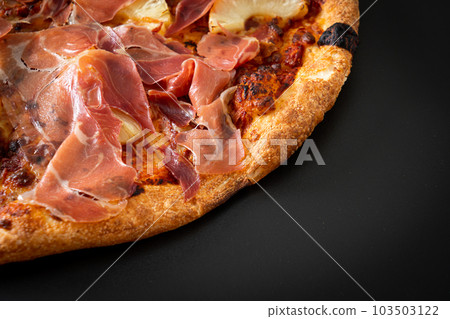 Pizza with prosciutto or parma ham pizza 103503122