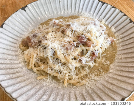 Bucatini Cacio e Pepe pasta with bacon 103503246