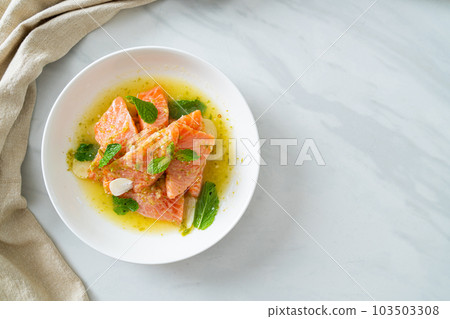 fresh salmon raw spicy seafood salad 103503308