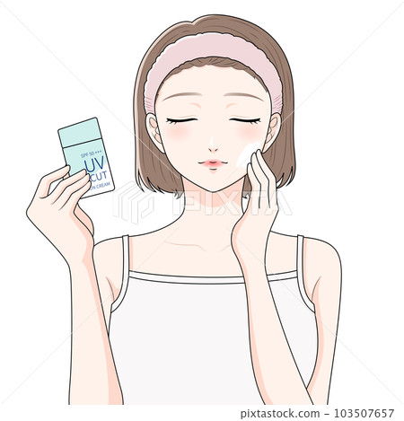 A woman wearing a hair band applying sunscreen A woman wearing a hair band applying sunscreen 103507657