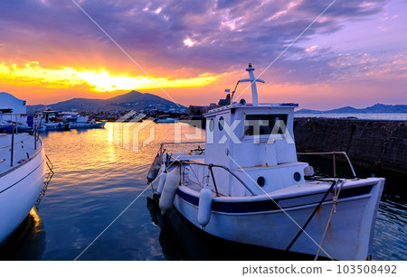 Colorful sunset in fishermen village and harbour. Colorful sunset in fishermen village and harbour. 103508492