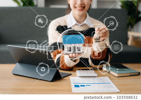 Considering buying a home, investing in real estate. Broker signs a sales agreement. agent, lease agreement, successful deal  with VR icon. 103508632