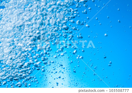 Air bubbles in water blue background Air bubbles in water blue background 103508777