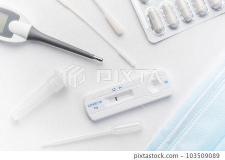 Home testing kit for coronavirus on a white background 103509089