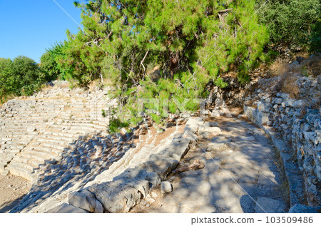 Ruins of antique amphitheater in ancient city of Phaselis near Camyuva, Turkey Ruins of antique amphitheater in ancient city of Phaselis near Camyuva, Turkey 103509486