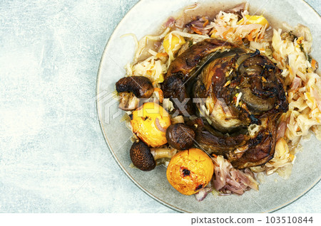 Smoked pork ham hock on the plate. 103510844