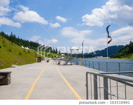 Empty Lake of Youth beach in Bukovel in summer Empty Lake of Youth beach in Bukovel in summer 103510991