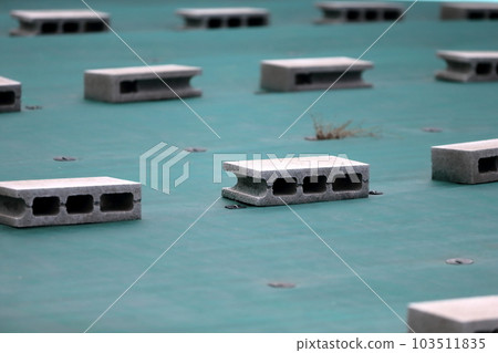 Land covered with anti-grass sheets Land covered with anti-grass sheets 103511835