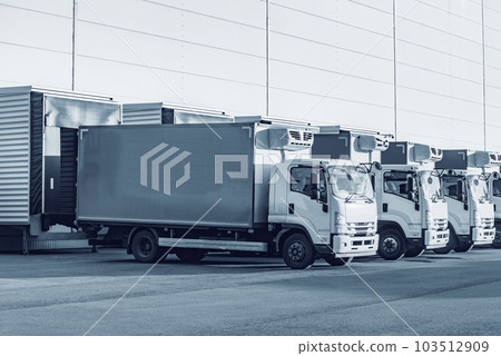 Freight trucks stand by the door. Freight trucks stand by the door. 103512909