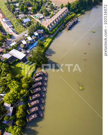 Aerial view of River Kwai and floating houses in Kanchanaburi province, Thailand Aerial view of River Kwai and floating houses in Kanchanaburi province, Thailand 103516072