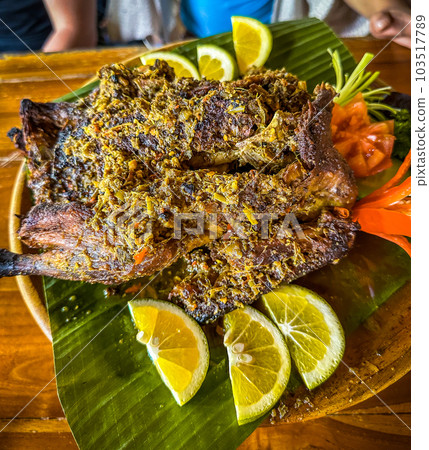 Crispy duck lunch at restaurant in Ubud, Bali, Indonesia 103517789