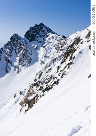Mt. Karasawa in the Northern Alps during the remaining snow season Mt. Maehotaka and Tsurione 103519062
