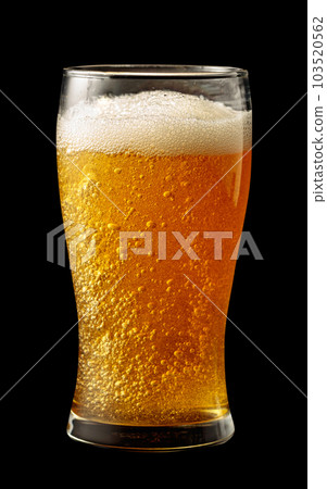 Glass of beer isolated on a black background. Glass of beer isolated on a black background. 103520562