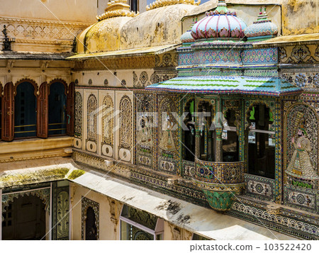 Amazing glass mosaics and wall decorations in peacock square, City palace complex, Udaipur, Rajasthan, India 103522420