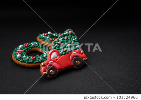 Delicious beautiful Christmas gingerbread cookies on a textured concrete background 103524966